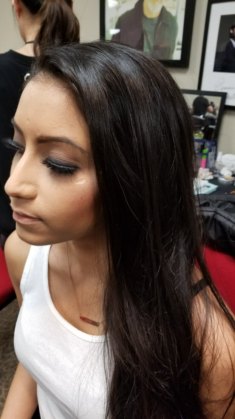 Editorial profile study with bronzed smoky eye, glowing skin and a nude lip