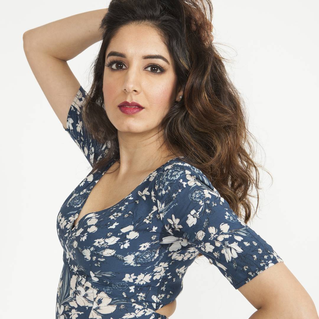 Studio fashion portrait with lifted lashes, sculpted cheeks and a deep berry lip