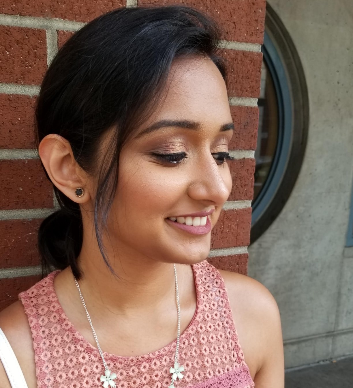 Soft daytime glam with warm mauve shadow, subtle liner and a rosy lip